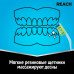 Зубная щетка средней жесткости Reach Массаж десен 1 шт, цвет в ассортименте